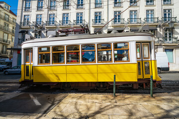 Fototapeta na wymiar Famous Tram 28 in Lisbon on sunny day. Portugal