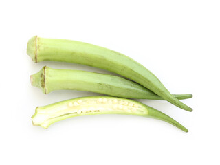 Raw green okra on white background