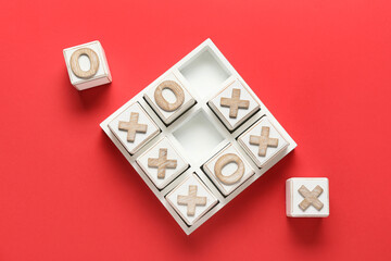 Tic-tac-toe game on red background