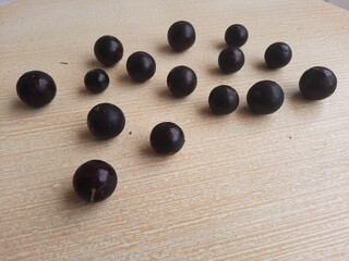 jaboticabas on a wooden table
