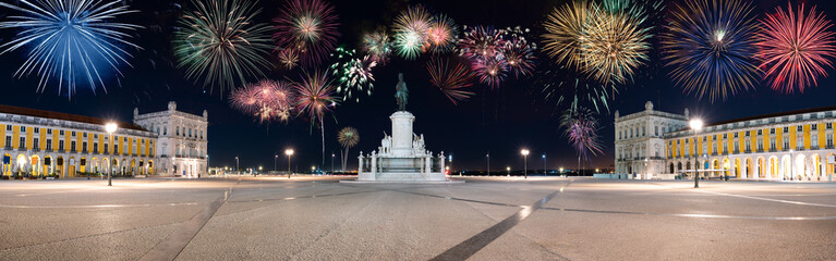 Fireworks display at Commerce Square (Praca do Comercio) with statue of of King Jose I in Lisbon....