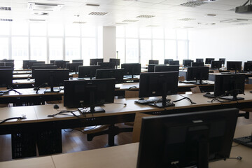Empty classroom with lots of computers, or open workspace