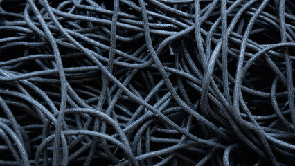 Black tangled threads abstract texture pattern background.A tangled of black shoelaces background.
