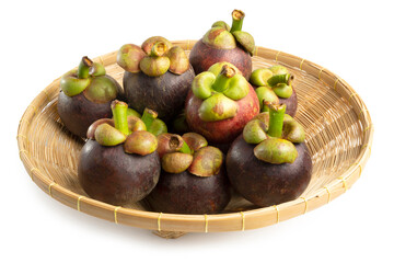 Fresh Organic Ripe Thai Mangosteens on a wicker basket isolated on white background. Clipping path