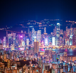 epic view of Hong Kong Night, from Kowloon to Hong Kong Island. metropolis in Asia, aerial, amazing colorful cityscape - obrazy, fototapety, plakaty