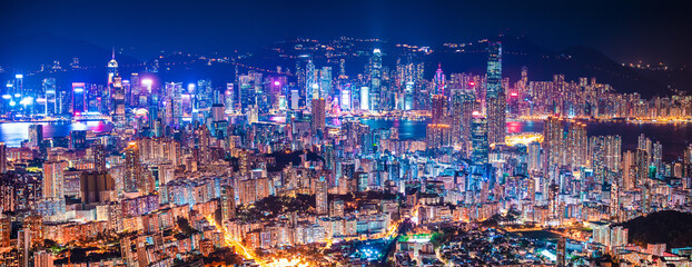 Fototapeta na wymiar epic view of Hong Kong Night, from Kowloon to Hong Kong Island. metropolis in Asia, aerial, amazing colorful cityscape