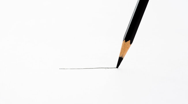 Color pencil drawing a line on white background