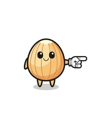 almond mascot with pointing right gesture