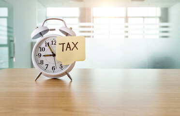Alarm clock with word tax