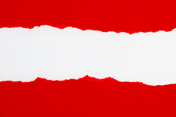 Red torn paper on white background
