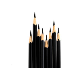 A row of black color pencils on white background