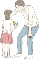 父の日にお父さんへプレゼントを渡す女の子