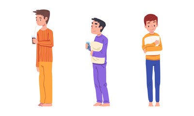 Cute boys in pajamas holding pillows set. Children having slumber party cartoon vector illustration