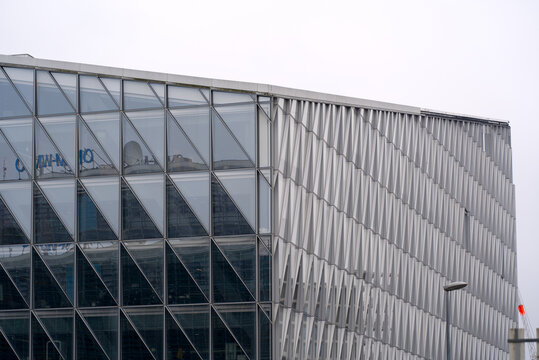 Modern office building with headquarters of Japan Tobacco International company at City of Geneva on a cloudy spring day. Photo taken March 18th, 2022, Geneva, Switzerland.