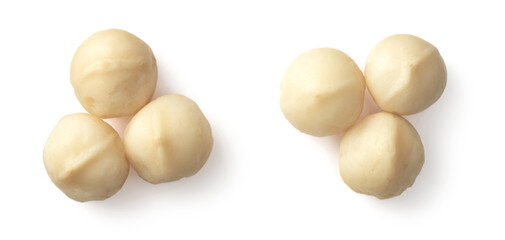 Unshelled macadamia nuts isolated on white background, top view.