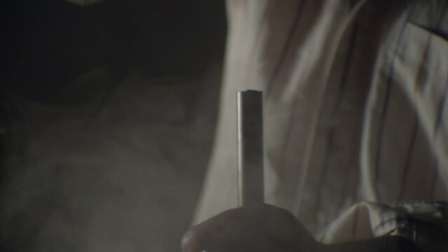 Hammer hitting a big nail in a dramatic misty ambience