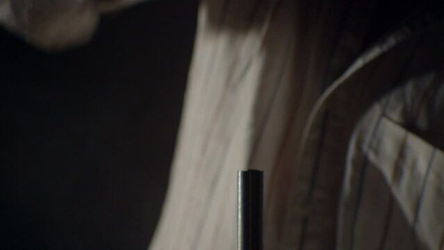 Hammer hitting a big nail in a dramatic misty ambience