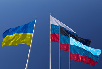 Flags of Ukraine, Russia, Donetsk People's Republic and Lugansk People's Republic. The Donetsk and...