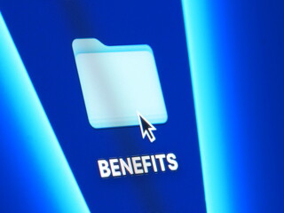 Benefits - macro shot of folder on computer desktop with mouse pointer - zooming in on screen pixels