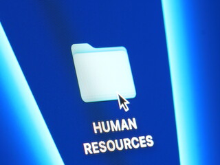 Human resources - macro shot of folder on computer desktop with mouse pointer - zooming in on screen pixels