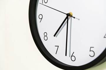 Closeup single clock hanging on wall