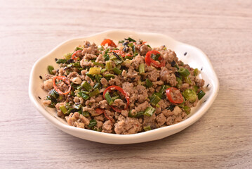 Sauteed minced pork with chive flowers in salted black bean is a popular Taiwanese dish, also known...