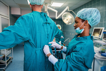 Doctors preparation for surgical operation in hospital. Healthcare medicine concept