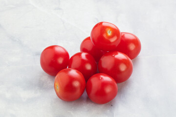Ripe juicy cherry tomatoes heap