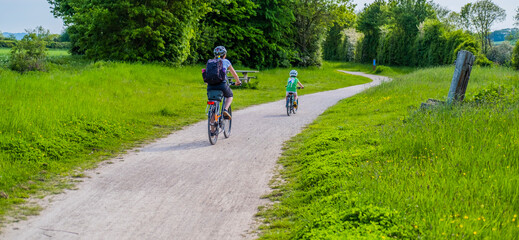 People walking and riding bicycles. Greenway hiking and cycling trail Stratford upon Avon...