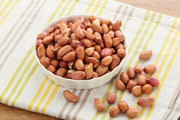 Raw peanut heap in the bowl