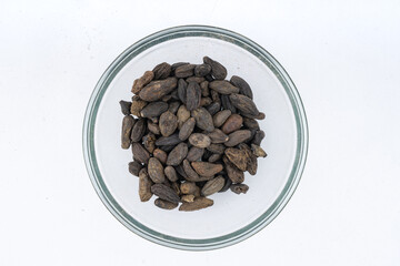 Choti Harad, Bal Harada, Terminalia chebula Retz - Myrobalan, seeds on isolated White 