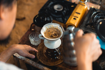 Fototapeta na wymiar Close up of hand brewing coffee