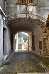 Fototapeta na wymiar A narrow street in Faicchio, a small village in the province of Benevento, Italy.
