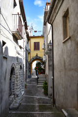 Fototapeta na wymiar A narrow street in Faicchio, a small village in the province of Benevento, Italy.