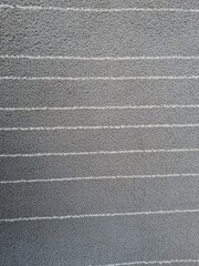 Gray and white striped fabric background