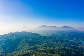 Fototapeta na wymiar Misty mountain landscape in Sai Kung Country Park, near High Island Reservoir, Hong Kong