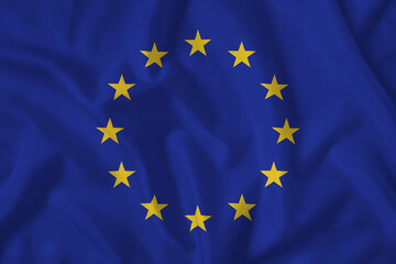 European Union flag with fabric texture. Close up shot, background
