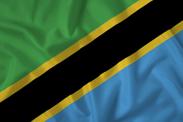 Tanzania flag with fabric texture. Close up shot, background