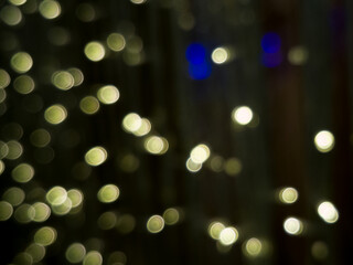 Obraz premium Bokeh lights. Beautiful Black background.