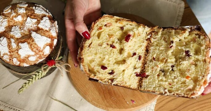 Happy Easter, Woman cut Easter cake for the holiday. The concept of preparing for the Easter holiday.