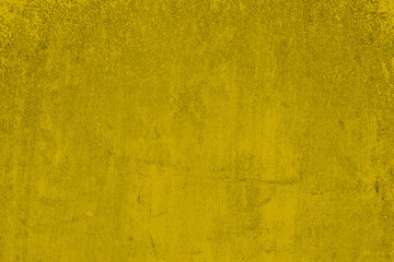 Yellow painted old cement plaster wall surface with grunge texture