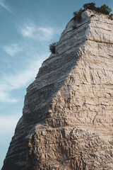 Pizzomunno, rock on the beach, Vieste, Gargano, Puglia, Italy. Imposing limestone monolith 25...