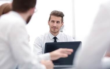business team meeting at the Desk.