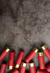 Red shotgun shells on texture background , Can be used as a background