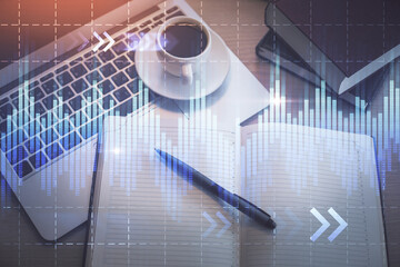 Stock market graph and top view computer on the table background. Multi exposure. Concept of...