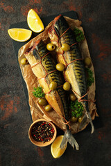 Concept of tasty food with smoked mackerel, top view