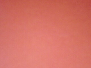 Burgundy, crimson, red, pink paper surface with a clear separation of colors as a background