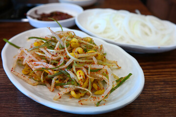 Blanched bean sprouts seasoned with green onions, garlic, soy sauce and sesame oil. This is one of the most common side dishes served in Korean homes.