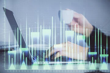 Double exposure of businesswoman hands typing on computer and forex graph hologram drawing. Financial analysis concept.