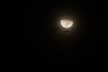 half moon at night on an isolated black background. copy space for life quotes and religion, greeting cards and decorations.